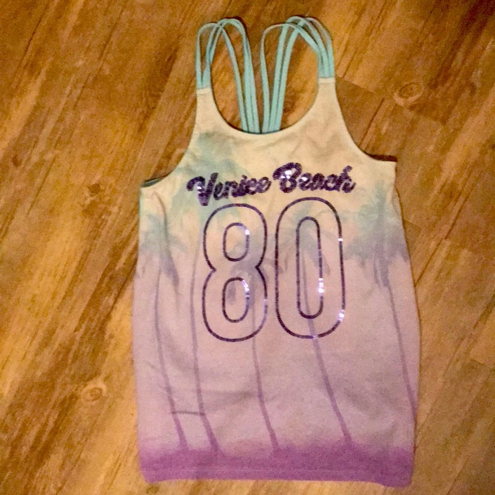 I am selling a “Venice beach 80” shirt.